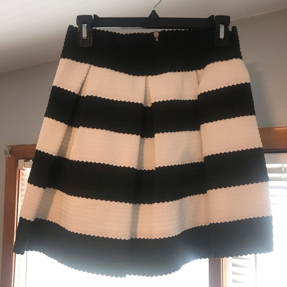 3/25$ Black and white skirt